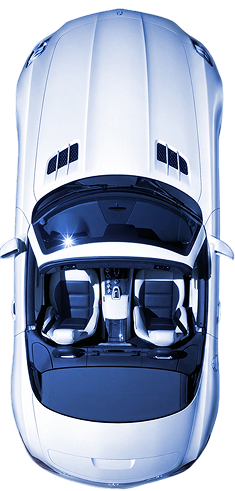 Top-down aerial view of a white convertible car with two seats visible inside.